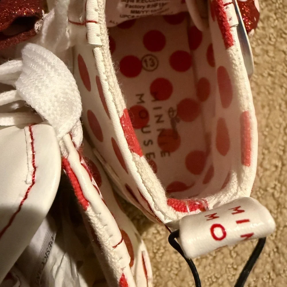 NWT. Disney Minnie Mouse high top sneakers with bows. Size 13